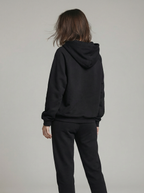 Loose sports sweatshirt with a hood