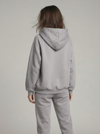 Loose sports sweatshirt with a hood