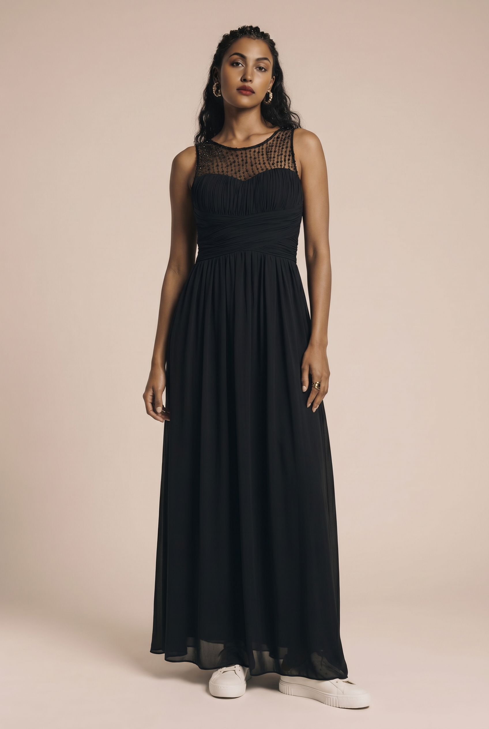 Long dress with decorative mesh and beads