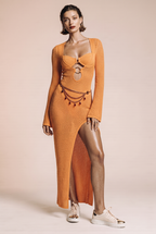 Dress with a slit and bell sleeves