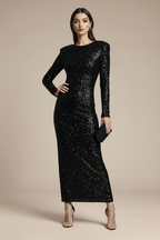 A dress with an open back and a decorative bow for New Year's Eve