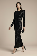 A dress with an open back and a decorative bow for New Year's Eve