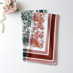 Wzorzysta chusta przedstawiająca łąkę