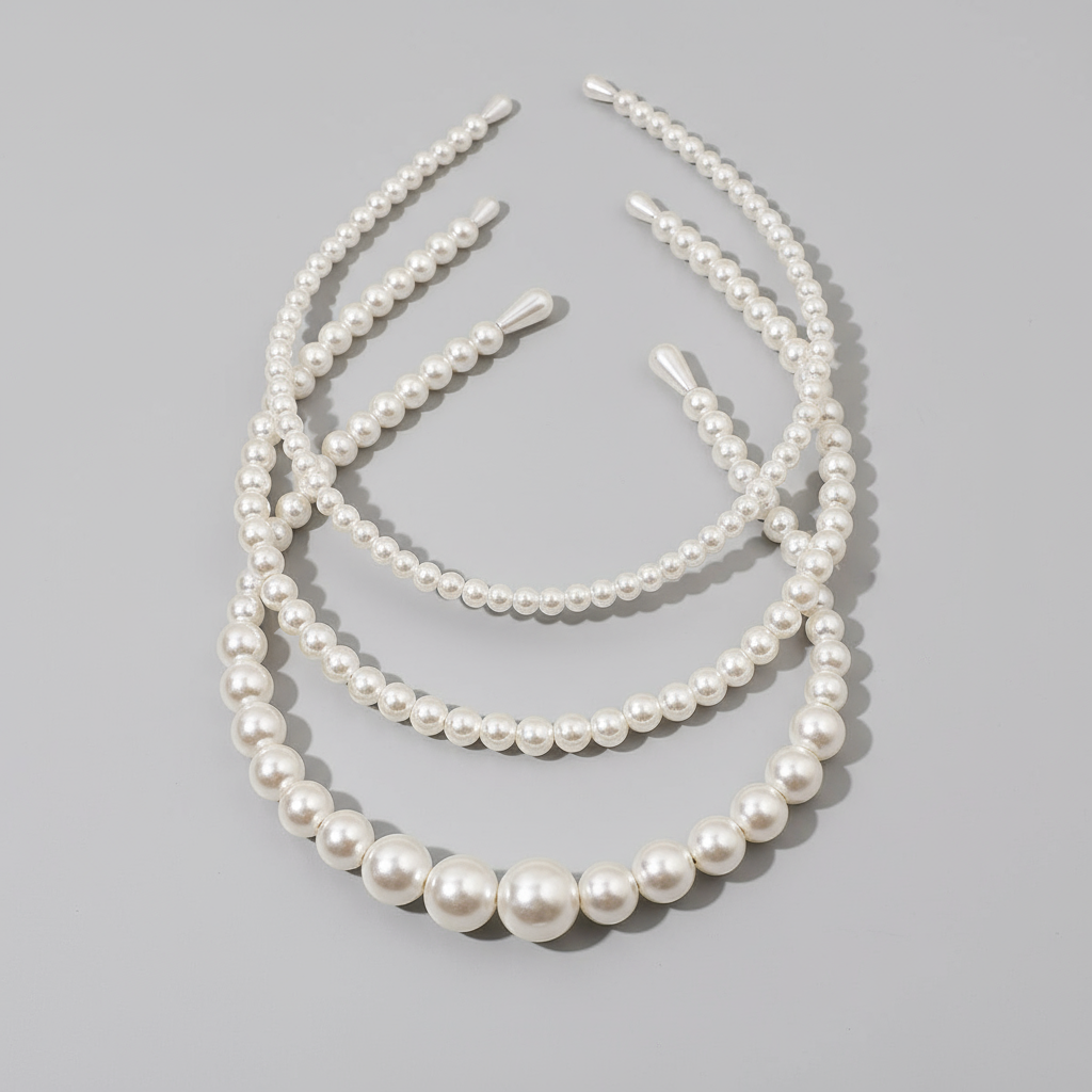 Zestaw trzech perłowych opasek do włosów