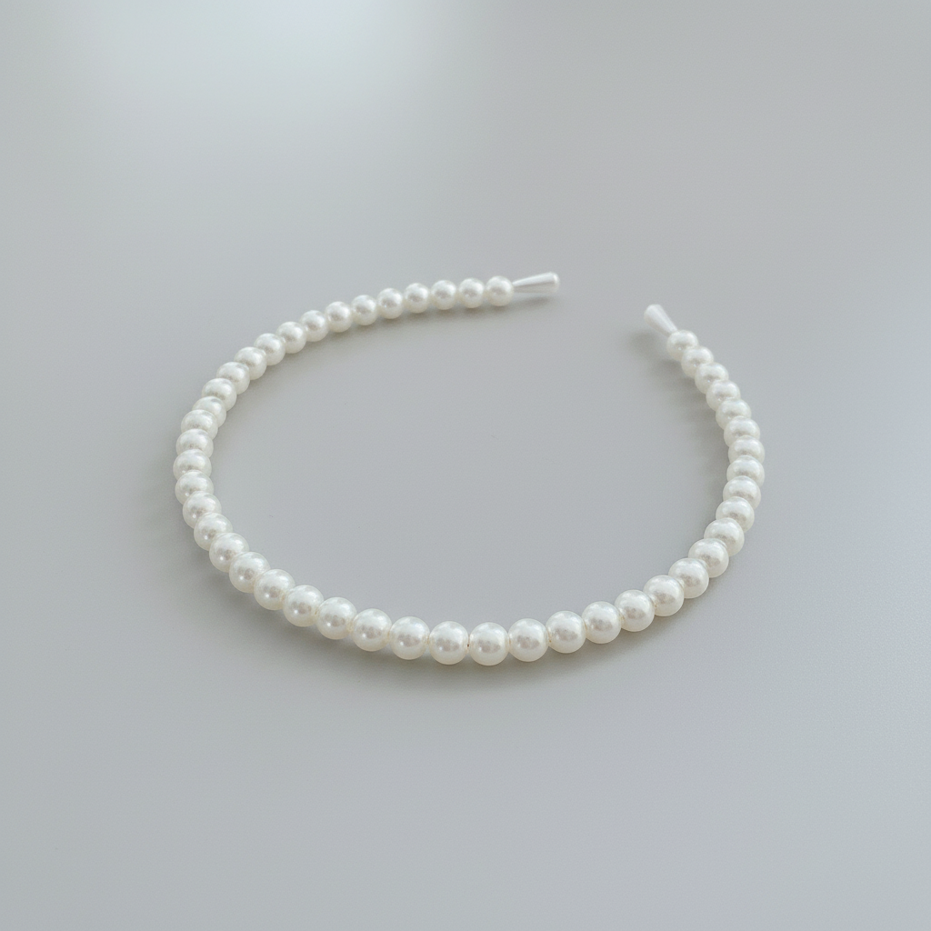 Zestaw trzech perłowych opasek do włosów