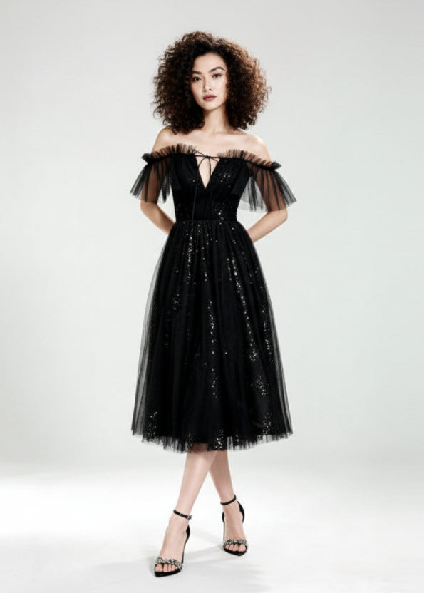 Wieczorowa sukienka z brokatem na studniówkę 2026