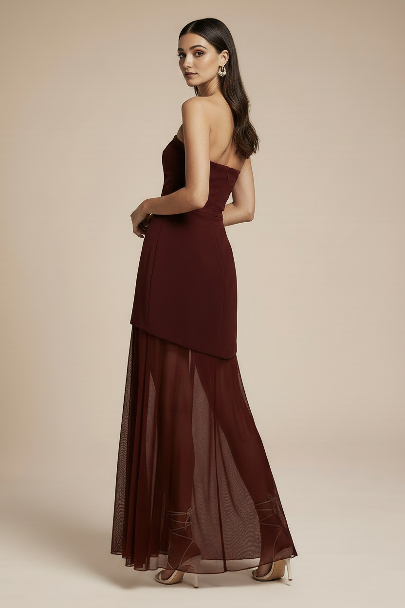 Model in burgundy dress - side pose
