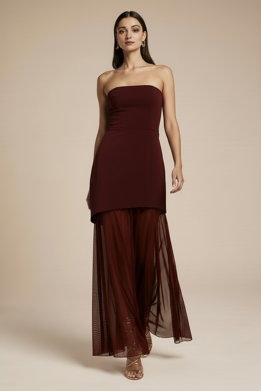 Model walking in burgundy dress