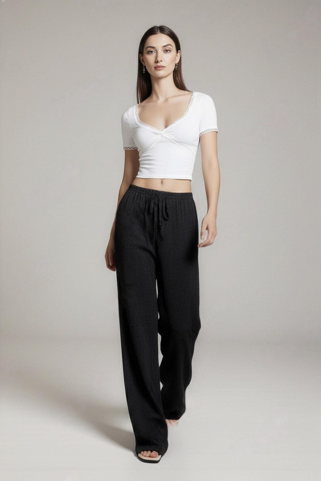 Modne luźne spodnie wiązane w pasie