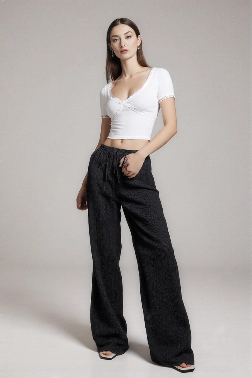 Modne luźne spodnie wiązane w pasie