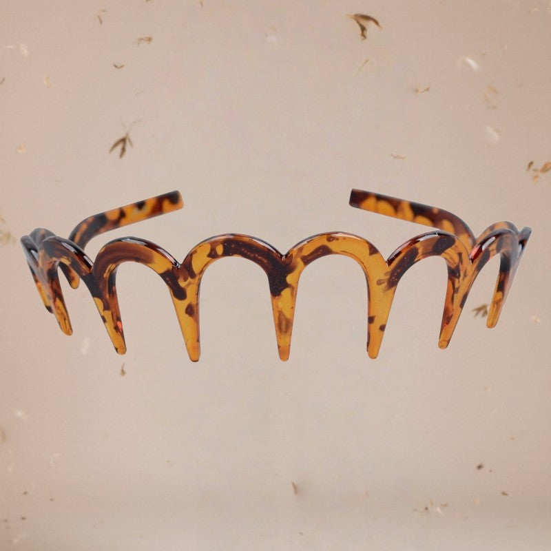 Zębata opaska na głowę w kształcie litery U