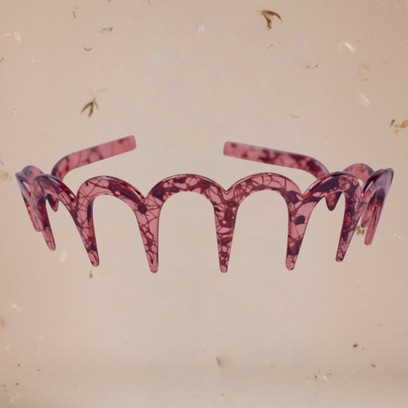 Zębata opaska na głowę w kształcie litery U